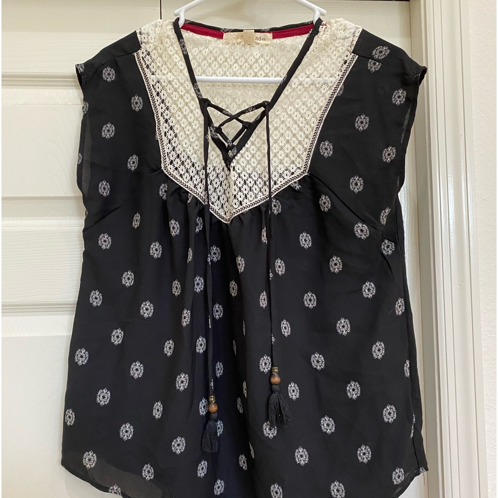NWOT. Rewind top. Black and white. Size small.